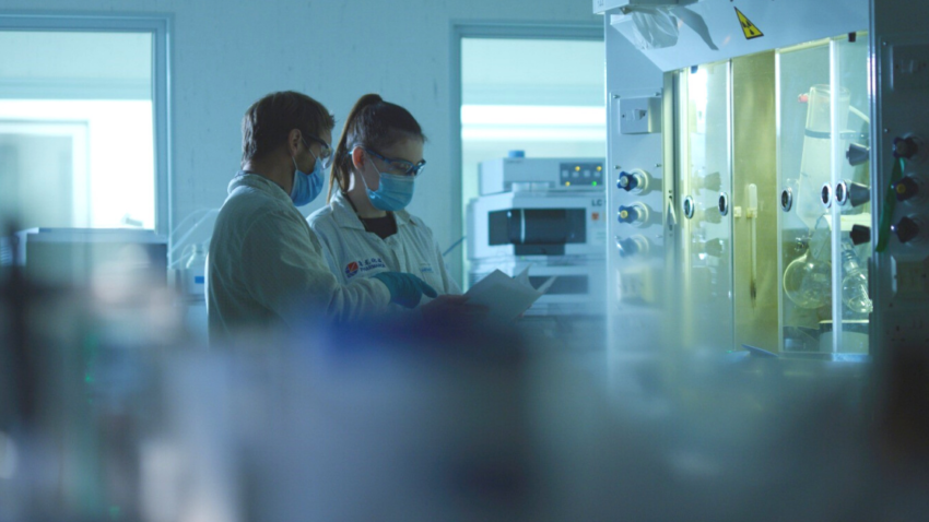 Research team members working in a lab