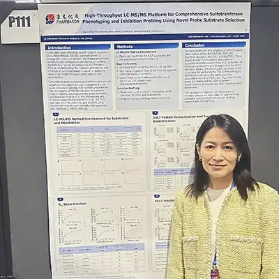 Scientist presenting a Pharmaron research poster on LC-MS/MS platform for sulfotransferase phenotyping and inhibition profiling at a scientific meeting.