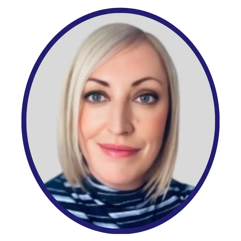 Woman with straight blonde hair and blue eyes, wearing a navy and white striped top, shown in a circular frame on a light grey background.